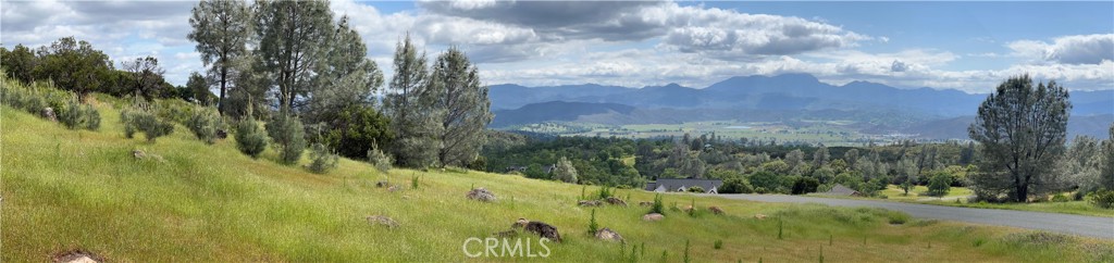 AWESOME PANORAMIC VALLEY AND MOUNTAIN VIEWS 2.7 acre parcel in the prestigious Shadow Hills subdivision of impressive high-end homes. Gently sloping parcel with 45 gpm well already installed with complete building plans for a 2272 sf home and a 1084 sf garage available. School and fire district fees have been paid, worth over $13,500, so you have a good head start in costs covered over $34,000 in total, making this an especially good deal. There is room for a pool and a guest unit as well. Impressive rock formations on an edge of the property. The neighborhood of high-end quality homes has wide paved streets with curbs and drainage. The spot gives you plenty of privacy and is very quiet, yet not far from Napa and Sonoma counties. The sweeping views toward the Mayacamas mountain range are inspiring, and a delight to behold, especially the gorgeous sunsets. This is the best small acreage subdivision in the south county and could be the very spot you've been looking for to build your dream home. Short term seller financing an option.
