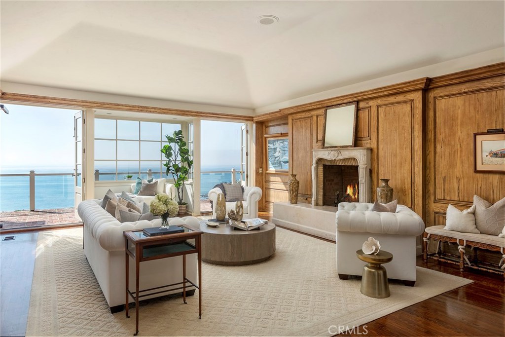 Newly remodeled traditional ocean view home featuring open beam ceilings and WOW ocean views from most rooms. First time offered!