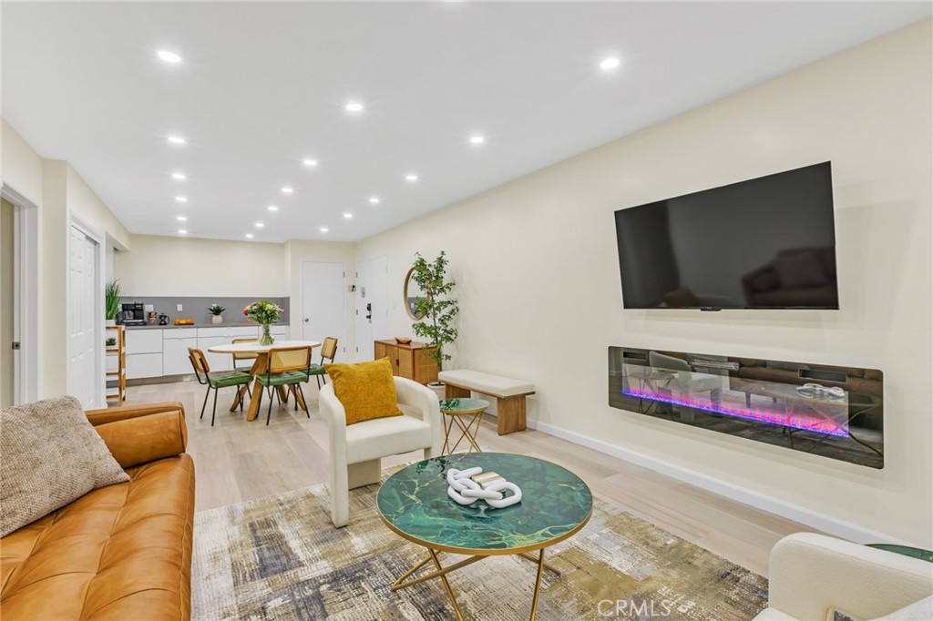 Welcome to 6199 Canterbury Dr Unit 101 in the heart of Culver City — a stunning, fully renovated and fully furnished 3-bedroom, 2-bathroom condo that effortlessly blends comfort, style and convenience. This beautifully updated residence offers 1,178 sq. ft. of living space and is filled with natural light and tasteful designer finishes. Originally built in 1967, the unit has been completely modernized with hardwood floors throughout, recessed can lighting and an open-concept layout perfect for both entertaining and everyday living. The kitchen is a true centerpiece, featuring modern cabinetry, sleek countertops and updated appliances that make cooking and hosting a delight. Each bedroom is generously sized and equipped with its own fan and wall-mounted heater, allowing for customized climate control in every room. Both bathrooms have been thoughtfully upgraded with high-end finishes. This ground-floor unit is located in a secure, well-maintained complex offering a host of amenities including a community clubhouse, sparkling pool and convenient in-building laundry facilities. You’ll also enjoy the ease of two assigned underground parking spaces — a rare and valuable perk in this area. The location is unbeatable, with easy access to popular shops, restaurants, entertainment and just minutes from LAX. Whether you’re commuting, traveling, or simply enjoying the vibrant lifestyle Culver City offers, this home puts you right where you want to be. With a monthly HOA fee of $550 covering essential services and maintenance. Seller financing available in this move-in-ready condo which is the perfect blend of value and luxury. Don’t miss your chance to own this beautifully curated home. Schedule your private showing today and fall in love with everything 6199 Canterbury Dr has to offer.