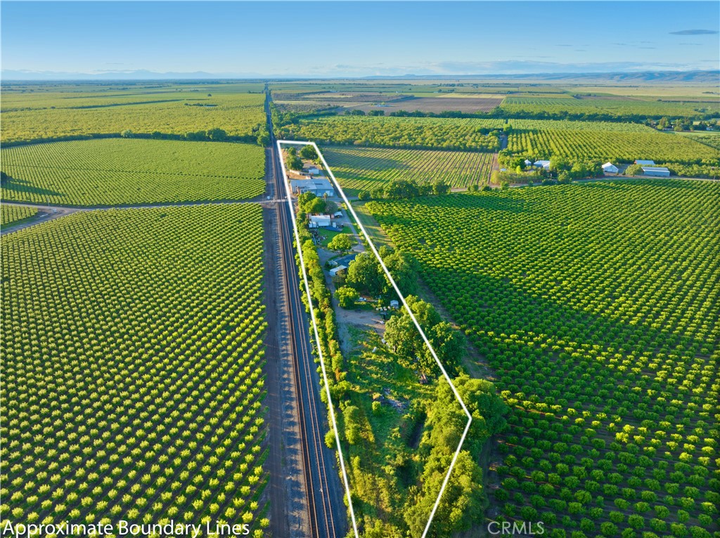 PRICE REDUCED!! Rare, unusual, and ONE-OF-A-KIND property. This is 9 acres of commercial/Residential income divided by Anita Rd.
Located just 8 miles north of Chico, this property borders the mainline railroad and includes 5 spurs. With an extra large open wharehouse and many other structures included, there is much added value... Complete with RV Pad, modular offices, multiple large metal carports, and a triple-wide mobile home.
Property also offers, electric private gates, beautiful groves of trees, and mature landscaping. Call today to learn more!!