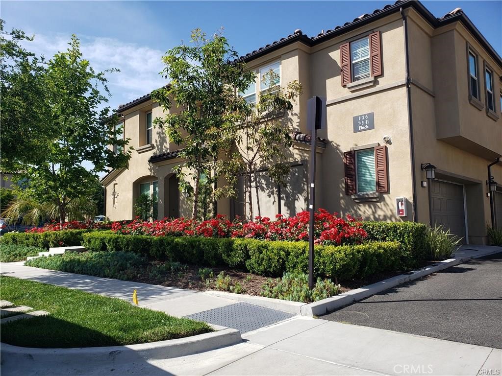 Discover this stunning corner condo with an open floor plan in the sought-after Rowe at Baker Ranch community. Offering 3 bedrooms, 2.5 bathrooms, and 1,695 sq. ft. of living space, this home is designed for both comfort and style. The great room downstairs is perfect for entertaining, complemented by a spacious kitchen with ample cabinet space. Enjoy natural lighting throughout the home, thanks to the abundance of windows. All bedrooms are conveniently located upstairs, along with a dedicated laundry area. A powder room is available downstairs for guests. The home also features a private patio, ideal for relaxing or dining outdoors, and a 2-car attached garage for your convenience. Situated close to parks, playgrounds, and the community’s incredible amenities, including pools, tot lots, expansive grassy areas, a clubhouse, basketball and tennis courts, and BBQ facilities. Come experience the vibrant lifestyle of Baker Ranch and make this lovely home your own!
