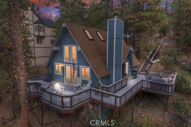 Yes, this is the cabin where the 8 tiny reindeer live in the off-season. However, this cabin isn't just decorated for Christmas in December, it's decorated for Christmas all year round & we LOVE IT! Make note of the hand-painted names of the Reindeer on the stairs! Just listed and Just DARLING!. In Lake Arrowhead so, full lake rights included. Great sense of privacy with long distance views and a superb outdoor entertaining deck (trex). Super popular floor plan with cathedral ceilings & great room on main. Plowed and maintained road for easy access. Located on the north siade of the lake and only a 2 minute drive to the Tavern Bay Beach Club & the lake's edge. Could come mostly furnished. (And, Yes! the super cool red bar stools STAY!)