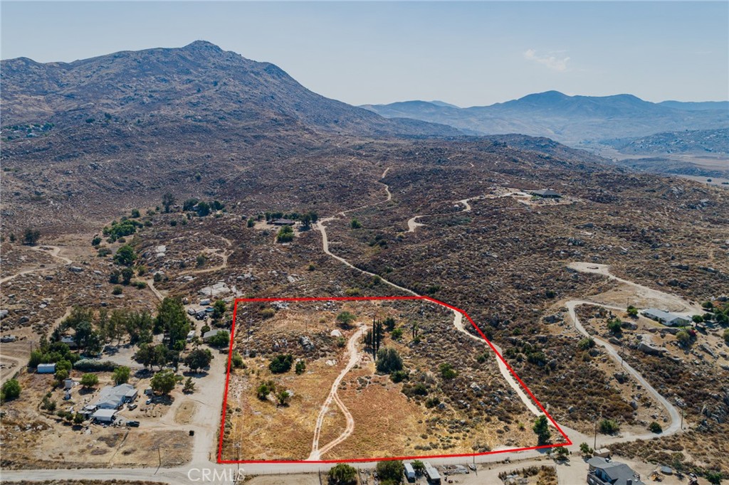 Experience the serene beauty and endless potential of country living on this 7.2-acre property in the picturesque Diamond Valley area of Hemet, California. Imagine building your dream home amidst the rolling hills and enjoying the tranquility and natural surroundings every day. With power and water meters already installed, this land is ready for you to bring your vision to life. The previous home’s foundations remain, providing a perfect starting point for your custom build. Discover the joy of country life, where you can create a personal haven away from the hustle and bustle. Located south of Hemet and east of Domengoni Dam, this property offers convenient access while maintaining the peace and quiet you seek. Embrace the opportunity to craft your ideal rural retreat and start living the quiet, fulfilling life you've always dreamed of. Have your agent reach out for more information and to schedule a viewing.