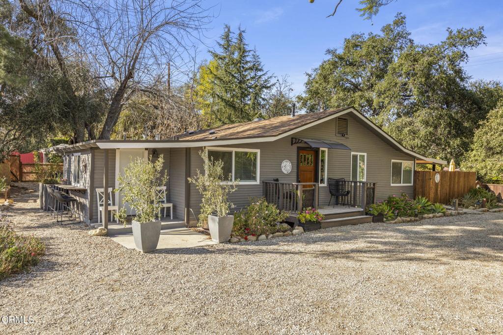 3 single family homes! Whether you're looking for a country compound to enjoy or a terrific real estate investment without restrictions on short term rentals, this is your ideal buy. More than just a home, this lovingly restored and remodeled property comprises a 2BR/2BA plus bunk room, 1476 sq. ft. farmhouse, two 2BR/1BA cottages, and a party barn with gas fireplace just for fun. All sitting pretty on .52 acres with stunning Topa Topa views! You'll love the country touches like beamed ceilings, wood floors, barn doors, and eat-in kitchens. All newer appliances, laundry rooms, skylights, newer windows and doors, and a natural gas fireplace. Two newer hot tubs bubble softly under the stars, and each home has covered outdoor dining. One even has a fire pit with a semi-circular stone seating bench. You could live in the Farmhouse and lease out the two cottages, or lease all of them out when you're not there and invite your family and friends to join you when you want to visit, or keep all three units generating income every day of the year. You won't find a more flexible real estate investment. The compound is conveniently located at the summit between Ojai and Santa Paula, making the drive from LA easier and trips into Ojai village a breeze. There are too many fun features to list here, so call your agent today to make a convenient appointment.