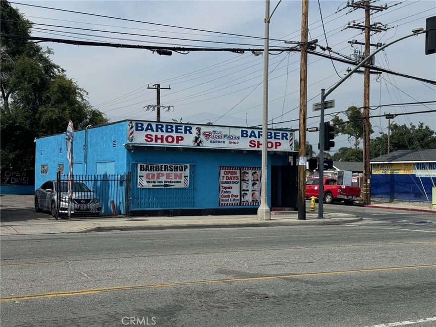 Great Commercial Retail Investment opportunity conveniently located minutes from the 215 FWY with extremely high vehicle traffic. This corner lot commercial property has a dual entry point through Baseline st and Massachussets. Currently operating as a barber shop with huge potential investment upside.