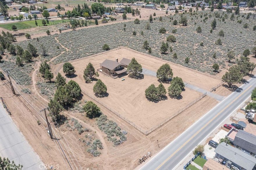 HOME ON 20 ACRES WITH TENTATIVE MAP! A rare opportunity to not only own a nice size home on 20 acres, but also have the ability to sub-divide into FIVE PARCELS (4+ one remainder). The Proposed Parcel Map includes THREE-3 ACRE lots (on Hatchery), ONE-7.49 Acre lot (on State Ln.) and A REMAINDER 2.9 ACRE lot (partially fenced) includes a 5 Bedroom, 3 Bathroom HOME with real-rock fireplace, covered patio and double-detached garage all with incredible mountain and Ski Slope views.