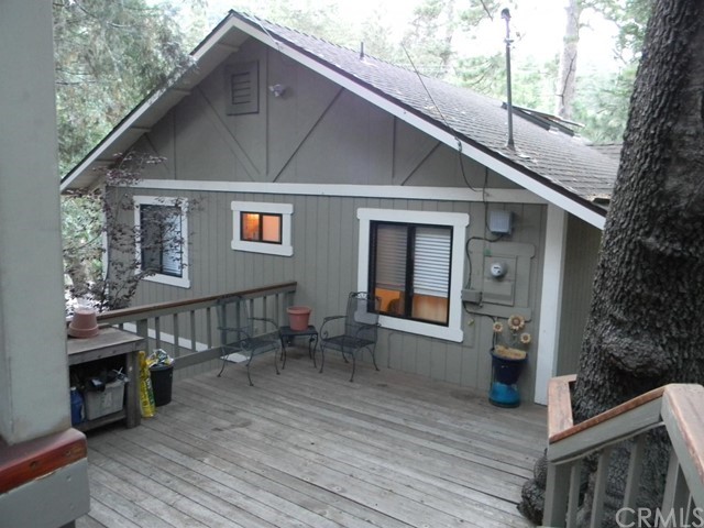 Welcome home to 286 Forest Circle! You won't want to delay seeing this warm, inviting home in walking distance to VOE Elementary because it will not last long! The entry level features living room with vaulted ceilings, skylights, river rock fireplace, Fully equipped kitchen and lovely french doors onto an expansive deck. You'll want to step out to enjoy the beautiful views of the mountains and peaceful open space, behind the home and the sounds of the seasonal creek too. Also on the main floor are two bedrooms and a full bathroom. Downstairs you'll find the master suite, an amazingly large laundry area with storage, an enclosed patio space and a small den or office. The back yard is fenced for kids or pets and gets plenty of sunshine for your gardening pleasure. Truly a special home that is not to be missed on your next tour of mountain property!
