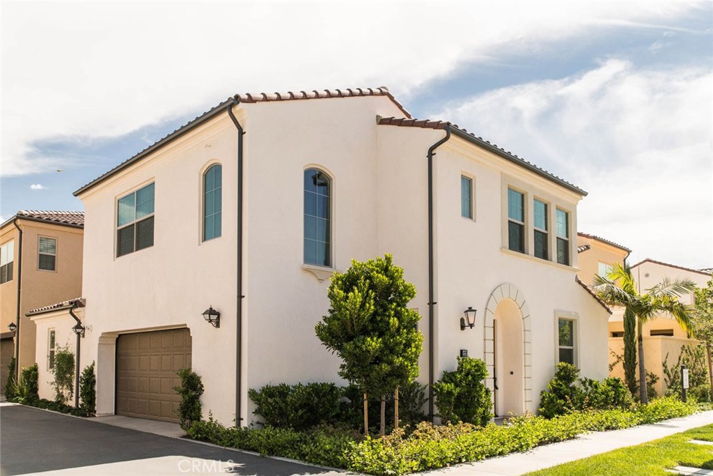 Visually stunning Italian and Spanish style exterior architecture. Gourmet kitchen with Bosch stainless steel appliance package featuring a 30' five burner cooktop with built-in oven and dishwasher. First floor private bedroom suite with linen cabinet. Jack and Jill bath serve bedrooms 2 and 3. Home is part of distinguished schools in Irvine Unified School District. Community features parks, swimming pools, and playground. Nearby Jeffery Open Space Trail (JOST); Orange County Great Park(OGGP) offers hiking, jogging, walking trails, while Sports Park offers area for ice skating, basketball, tennis, soccer, volleyball, softball, biking. Nearby Irvine Specturm and shopping centers, easy access to freeway 5,405,133,241.
