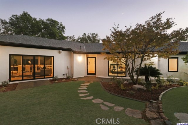 Welcome to 520 Lakeview Rd. A true Pasadena dream home tucked away on over half an acre of lush landscape in the picturesque, San Rafael neighborhood. This 5 bed / 5 bath estate will captivate and inspire you! Everything has been lovingly customized with painstaking detail, breathtaking design and thoughtfulness. You'll discover beautiful, tranquil indoor / outdoor areas that flow between each space, perfect for entertaining or spending time with the family while your favorite tunes play on the surround sound system. The layout offers an ideal flow with three spacious bedrooms on the main level and two more plus a 2nd family room, home gym/workshop on the lower level. The grand open concept chef's kitchen spills seamlessly to a breathtaking dining space that features huge floor to ceiling wrap-around windows overlooking beautiful mature greenery in every direction! You'll be met with a sense of calm and serenity every time you step foot in this special space which also connects to a bright main living room with fireplace! The luxurious penthouse-suite inspired primary bedroom leaves nothing to be desired; an enormous walk-in closet space and an ensuite bath featuring a deep soaking tub and oversized steam shower that will make you feel like you've just entered your own private spa! All of which overlooks a lush park-like lot with a long ample driveway and front courtyard that offers a feeling of privacy and seclusion. With easy access to The Rose Bowl and Old Town Pasadena this location is prime and close to everything while still being perfectly situated in the heart of one of SW Pasadena's most charming neighborhoods! Copy & Paste this link for property video: https://player.vimeo.com/video/630224397?h=55af560846 Copy & Paste this link for the virtual tour: https://my.matterport.com/show/?m=NGhg3SSEVfJ&mls=1