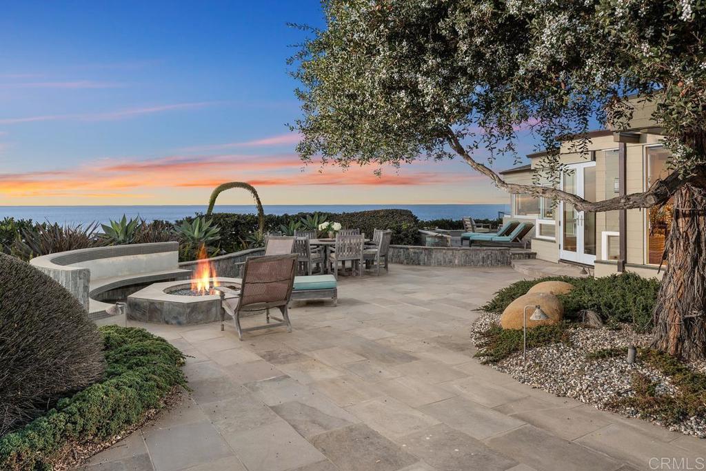 Welcome to this enchanting and hidden coastal gem! This modern California OCEAN FRONT home in Del Mar is available for summer lease! The stunning 4 bedroom, 3.5 bath home has sweeping panoramic coastal views and boast extra living space with an office and a large entertainment room with a full kitchen & bar. There are 3 exterior ocean front patios, with a fire pit, dining area, sitting area and lounge area. There is a walled side patio, with separate access, with an outdoor shower & perfect for BBQ-ing and additional entertaining. This home exudes privacy and understated elegance. Pricing: AUG 5-Sep 5 30K, Sep 20K. Available Breeders Cup.