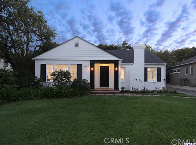 This is the home you've been promising you'll find! Nestled amongst the beautiful backdrop of the San Gabriel Mountains in one of the most desirable areas of NE Altadena, this meticulously re-imagined three-bedroom two-bathroom home features modern luxury from the moment you walk in! Past the lush, custom-landscaped front lawn you'll enter into a bright and welcoming open family room with gorgeous wood flooring and classy designer finishes throughout. Spend quiet evening cozied in front of the fireplace, or entertain in the open chef's kitchen (w/ new stainless steel appliances) overlooking a large back patio with a built-in fire pit, perfect for outdoor family meals and gatherings- surrounded by an expansive backyard w/ mature shade trees providing privacy and serenity. Your day will draw to a close in your private master en-suite with picture windows and deep walk-in closet. Outside, the weekend will always be right around the corner with the William Bell-designed Altadena golf course and the Eaton Canyon Trailhead within just a stones throw away! -And your tools and toys stored in the spacious detached garage tucked out of sight at the end of your long driveway.