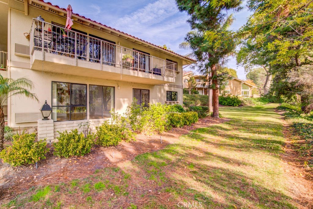 CASA LINDA; CREEK FRONT. Amazing 180 degree Aliso Wilderness Creek views from this home. Large open patio to enjoy outdoor living. Large green belt to the side of the home and huge views to the front. VERY PRIVATE. Enjoy the creek side walking path from the front door. Updated kitchen with added pantry and new lighting. New association owned and maintained appliances. Freshly painted. Laminate Wood Look floors throughout. This beautiful home is move in ready! Enjoy all the amenities of this active 55+ community with golf, tennis, swimming, 7 clubhouses, over 200+ active clubs, 2 gyms, 1 library and a free bus system. Laguna Woods is in the heart of South Orange County only minutes from famous Laguna Beach!
Carport 677-5