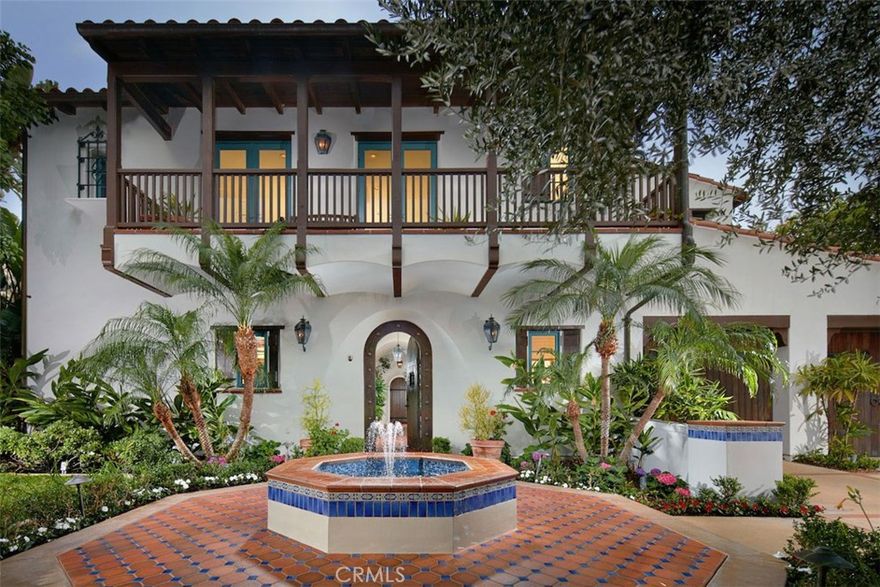 Beautiful former model Watermark home in exclusive Crystal Cove with ocean views. 4 bedrooms, 5 and 2 half baths.