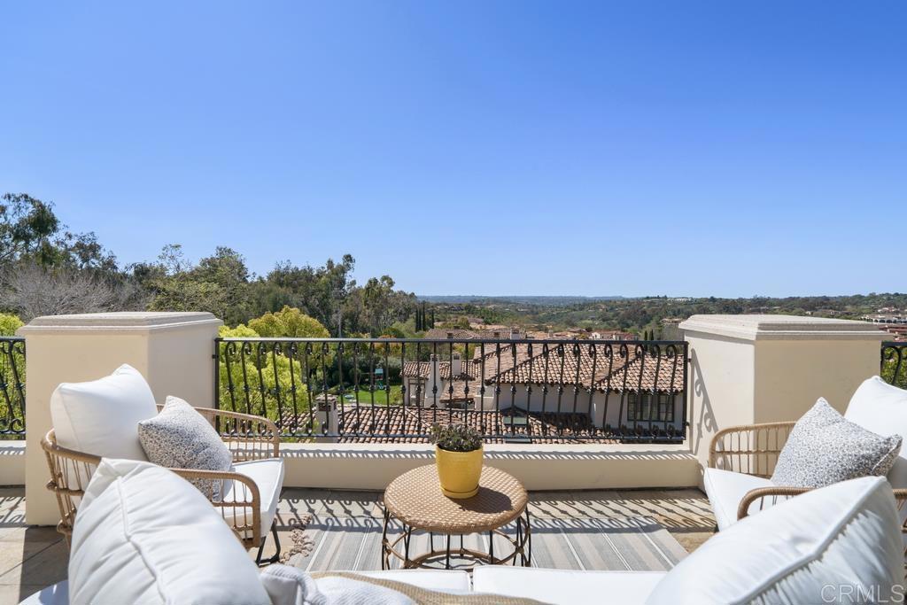 Step into a realm of unmatched luxury with this meticulously maintained multigenerational home nestled in the exclusive guard-gated community of the Bridges at Rancho Santa Fe. Undoubtedly the epitome of BEST VALUE in Rancho Santa Fe, this residence spans 13,108 sq. feet, offering sweeping views of the 16th fairway. Recently renovated to perfection, the property boasts all-new bathrooms, kitchens, interior/exterior paint, and top-of-the-line fixtures, complemented by a solar system. This home not only presents itself as a great value but is MOVE IN READY, ensuring immediate comfort and convenience. The primary suite defines opulence with its private wrap-around deck, panoramic views, an enormous dream closet, and a sumptuous master spa bath featuring a steam shower, dry sauna, and a spacious soaking tub. The attached guest suite, with a separate entrance and balcony, provides the ideal space for multigenerational living, featuring a bedroom, separate living area, and kitchenette. The backyard transforms into an entertainer's haven, featuring a pool, spa, two BBQs, an outdoor fire pit, putting green, pizza oven, and a dog run. Indoors, indulge in the luxury of a Savant music system, complemented by a plush movie theater with eight reclining chairs and top-of-the-line surround sound. Additional highlights include ample garage space for 5 cars. Situated within the highly sought-after Rancho Santa Fe School District, including the prestigious Roger Rowe School, this residence is a testament to both luxury and practicality. An invitation to experience this home in person is extended – a showcase of unparalleled elegance and charm awaits those seeking the epitome of sophisticated living.