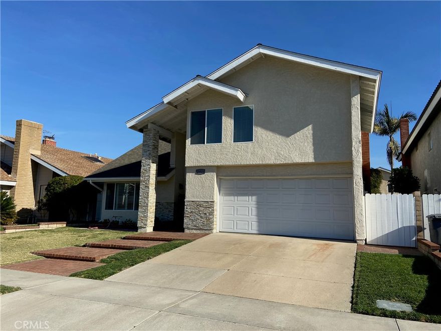 Ideally located in Lake Forest's Aliso Woods tract, this beautiful two story, 4 bedroom, 2.5 bathroom home features almost 2900 square feet of upgraded and well cared for living space!  From the moment you enter this home, you'll notice the attention to detail throughout. The entry opens into the spacious front family (living room) and dining area which leads to the remodeled gourmet kitchen and back family room - a natural fit for gatherings and entertaining.  The ground level also includes a wet bar, half bath, laundry room and the two car garage.  Upstairs you’ll find the 3 secondary bedrooms, the hall bathroom with dual sinks and the welcoming master suite with fireplace & wetbar. Not to be missed is the exquisite master bathroom spa like remodel (see pics and video!).  The backyard features more space for entertaining along with an in-ground spa!  Only minutes to shopping, entertainment, and most Lake Forest and Mission Viejo amenities.