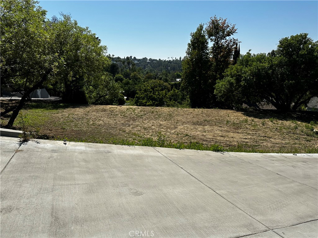 MOTIVATED SELLER!
Embrace the opportunity to build your dream home on this exceptional 25,000 square foot residential lot nestled in the prestigious hills of Encino. Boasting breathtaking seclusion, this expansive property is a developer's delight or ideal for those envisioning a bespoke residence.
Imagine the possibilities on this prime lot, where previous plans projected a stunning 4,500 square foot home perfectly integrating with its surroundings. Now enhanced with brand new gated access and a freshly paved entry road, convenience meets luxury at every turn.
Seize this rare chance to create a masterpiece tailored to your vision in one of Encino's most coveted locations. Whether you're drawn to the allure of crafting a custom estate or investing in future development, this property promises unmatched potential and enduring value. Discover the essence of elevated living—schedule your visit today!
