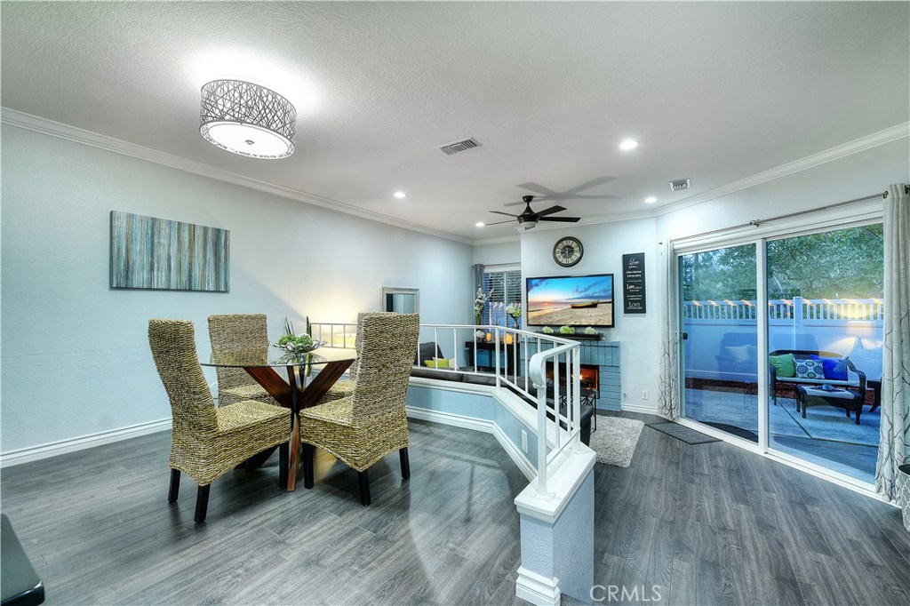 A MUST SEE! Stunning Crestline Townhome with a modern and sophisticated style features 3 bedrooms, 2.5 baths, over 1,800 SF in living space, new energy efficient windows throughout the entire home, custom blinds on every window, fans in every bedroom and living room, new 6 ton AC, dimmable recessed lighting throughout, entire AC ducting system replaced, keyless entry front door lock and Nest thermostat with WiFi and cell phone controls. Beautifully remodeled kitchen with granite countertops, barn sink, ultra-quiet garbage disposal, gorgeous cabinetry, matching stainless steel appliances, and a desirable breakfast bar. Kitchen opens to the dining area perfect for entertaining. Spacious living room boasts stone fireplace and sliding door to enclosed patio. Master Suite with multiple windows, walk in closet and remodeled shower over tub. The 3rd bedroom is oversize with large custom walk-in closet and large overhead storage, extra large ceiling fan, and two additional AC ducts for increase heating and cooling efficiency. Upstairs full size laundry area in closet. Enclosed patio is a private oasis perfect for relaxing and enjoying the weather. The two car garage includes built in storage. Association amenities provide multiple pools, spas and clubhouse. This immaculate property is located close to community parks, Whole Foods, Trader Joe's, Mother's Market, and Costco, and it is nearby freeway and toll road access! You will adore this Crestline home!