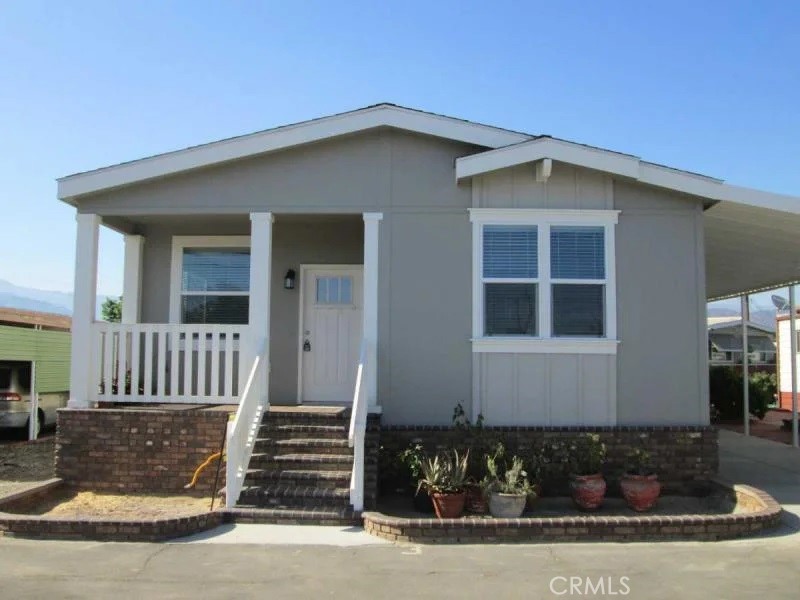 "Ready To Build" Beautiful New Manufactured Home Coming Soon to Lamplighter Chino, an All-Age Community! A rare opportunity, this home will have 4 bedrooms and 2 bathrooms at approx. 1620 sq. ft. The covered front porch with Trex Decking will be the main entrance to the home. Once inside you will fall in love with the spacious open floor plan, a large kitchen/dining area opening to the living room. The kitchen will have beautifully upgraded raised hardwood cabinets in an Espresso color, granite countertops, stainless steel appliances (dishwasher, oven/range, refrigerator, and built-in microwave oven), a kitchen island, and a farmhouse-style sink. The 3 bedrooms will share the guest bathroom that has a shower/tub. The master bedroom has an adjoining bathroom that features a double vanity sink and walk-in shower. The home will also have a laundry room with a washer and dryer hookups and overhead cabinets. The picture of the home shown will be similar to the actual home.