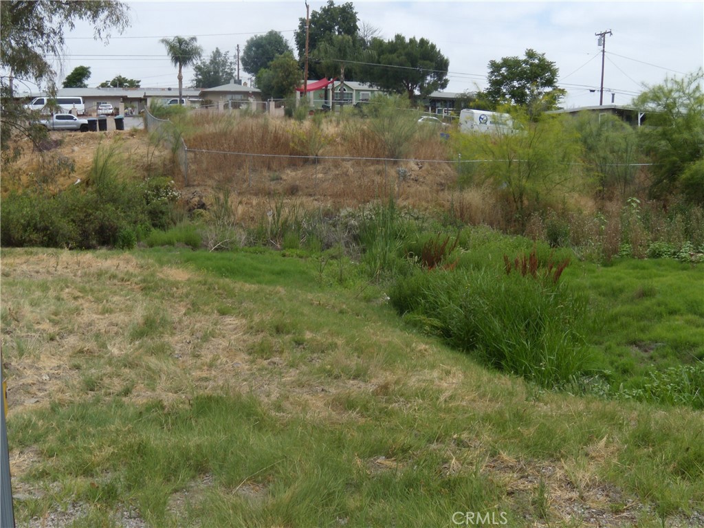Wonderful Investment on this .12 Acres Vacant lot located on a paved road and located in an existing neighborhood surrounded by homes, utilities in street, Lot measures roughly 50 Ft road front X 100 Ft long, Adjacent .12 Acres Lot for sale also OC24064925. At the present time there is a moratorium on new construction in this area until the city sewer system is in place, Please call Menifee City Water District for more information, Property located north of 23559 Mt Vernon Pl