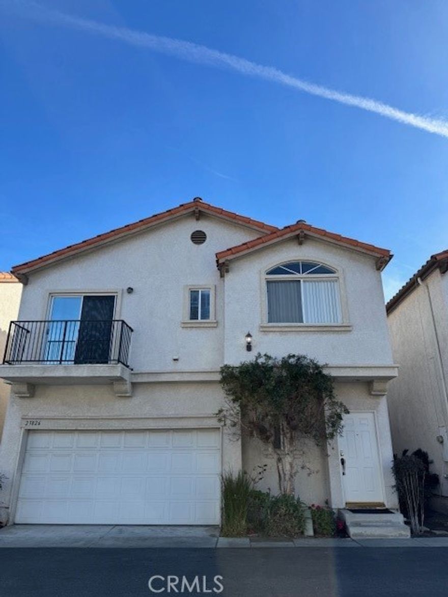 Beautiful South Torrance Home with 4-bedroom, 2.5-bath. bathroom home offers exceptional comfort and style. Featuring laminate wood flooring throughout, the inviting living spaces include a bright kitchen with granite countertops, ample cabinetry, and brand-new stainless steel appliances, including a stove, oven, and dishwasher. Conveniently direct access from garage to the kitchen. The warmth of a cozy fireplace in the family/living room, which opens to the dining and kitchen. The main level includes a powder room near the living room for guests. Upstairs, you’ll find all four spacious bedrooms with high ceilings. The expansive primary suite boasts a luxurious en-suite bathroom with marble countertops, dual sinks, brand-new faucets, marble shower walls, floors, a separate large soaking tub, and an oversized wall closet. All bedrooms feature mirrored closet doors, with one guest bedroom offering its own private balcony. A hallway full bathroom includes a tiled floor, marble countertop, and new faucet, while the upstairs laundry room provides convenience with generous cabinetry and windows. Additional features include a skylight, built-in shelving, and ample storage in the hallway.The private backyard with a lime tree. This home also features a two-car attached garage and is conveniently located within walking distance to parks, shops, restaurants, and medical facilities.  Close to award winning Torrance schools.