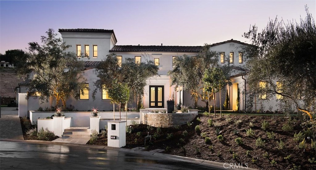 BRAND NEW ESTATE HOME! Experience the finest in luxury living in the newly completed Estate on a quiet cul-de-sac on the hillside of Orange County's prestigious Shady Canyon community. Behind the gates, drive along winding roads with natural rugged surroundings before arriving at your NEW Santa Barbara-style 9,158 sf estate, nestled on an expansive 28,088 sf lot. The inviting open floor plan, with 14 foot high ceilings and oversize windows, sliding pocket doors, and custom french doors, provides spectacular canyon views out toward Newport Beach. Upon entry, one is struck by the contemporary, clean interior style. The floor plan gracefully compliments an expansive yard with a luxury pool and spa. Family and guests will enjoy 6 spacious bedrooms, 7.5 baths, a 6-car garage, Private Office, Gym, Home Theater, Tower Loft, large Great Room and adjoining Dining Room. The large Gourmet Kitchen, with back kitchen, and Family Room connect to 2 adjoining California Rooms. A ground-level junior master suite boasts large double-doors opening directly to the pool deck. The Master Suite includes a private covered deck with contemporary fireplace, master bath, and large walk-in closets. White Oak floors, Custom Granite Counters and Cabinets, Designer Appliances and Fixtures, prewiring for SMART home technology are just a few of the custom features. 24 hour security and gated. Only minutes from the beach, Tom Fazio-designed golf course, airport, freeways, and world-class shopping and dining.