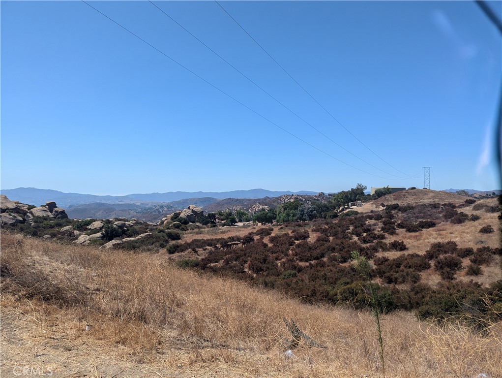 EXCEPTIONAL VACANT LOT IN WEST HILLS – YOUR PRIVATE ESCAPE AWAITS! DISCOVER A UNIQUE OPPORTUNITY TO CREATE YOUR OWN PRIVATE ESTATE IN THE SERENE SANTA SUSANA MOUNTAINS. THIS SECLUDED 6.8-ACRE LOT OFFERS A PERFECT BLEND OF TRANQUILITY AND NATURAL BEAUTY, FEATURING LUSH LANDSCAPES, A GATED ENTRANCE, AND EXPANSIVE VIEWS THAT CAN INSPIRE YOUR DREAM HOME. KEY FEATURES: **SPACIOUS LOT** OVER 6.8 ACRES OF VERDANT LAND, IDEAL FOR BUILDING YOUR CUSTOM RESIDENCE OR RETREAT. **FLAT PAD WITH ROLLING SLOPES**: ENJOY A FLAT PAD THAT'S READY FOR DEVELOPMENT, COMPLEMENTED BY GENTLE ROLLING SLOPES THAT ENHANCE THE PROPERTY'S CHARM. **STUNNING VIEWS**: REVEL IN BREATHTAKING VISTAS OF THE SURROUNDING MOUNTAINS AND VALLEY—PERFECT FOR SUNSET GATHERINGS OR PEACEFUL MORNINGS. **SECLUDED LOCATION**: EXPERIENCE THE PRIVACY AND SECURITY OF A GATED ENTRANCE, PROVIDING A SERENE ESCAPE FROM THE HUSTLE AND BUSTLE OF CITY LIFE. **ESTABLISHED NEIGHBORHOOD**: JOIN A COMMUNITY WHERE SEVERAL BEAUTIFUL HOMES HAVE ALREADY BEEN BUILT, ENSURING A SENSE OF BELONGING AND APPRECIATION FOR THE NATURAL LANDSCAPE. THIS PROPERTY IS AN IDEAL CANVAS FOR YOUR VISION—WHETHER YOU SEEK A TRANQUIL GETAWAY, A FAMILY ESTATE, OR AN INVESTMENT OPPORTUNITY. DON’T MISS OUT ON THE CHANCE TO OWN A SLICE OF PARADISE IN WEST HILLS. CONTACT US TODAY FOR A PRIVATE SHOWING OR MORE INFORMATION!