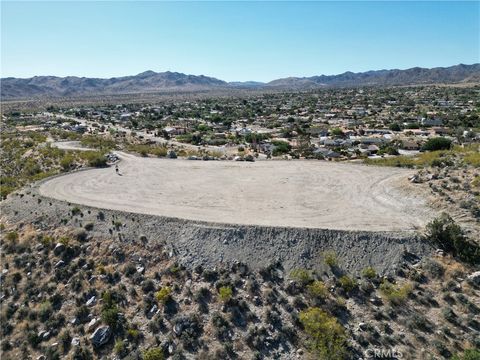 Photo of 57910 Joshua Drive, Yucca Valley, CA 92284 (MLS # JT24186700) Photo of 57910 Joshua Drive, Yucca Valley, CA 92284 (MLS # JT24186700)