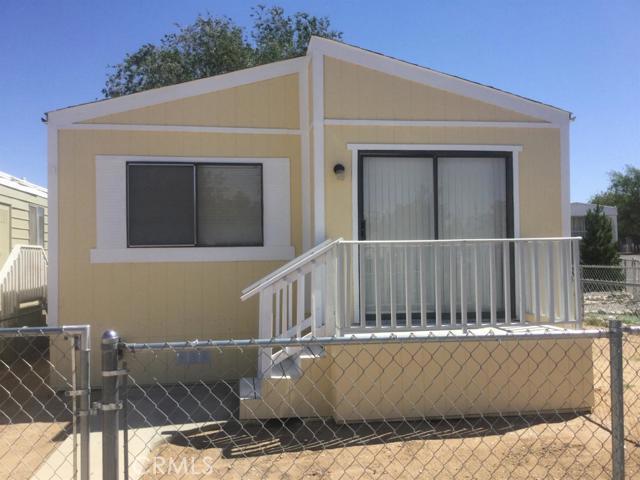 Beautiful 2 bedroom 2 bath doublewide located in an all age park next to elementary school. Many recent upgrades including carpet, two tone paint, stainless steel stove and dishwasher. Property is equipped with heater and cooler and indoor laundry. Skylight in kitchen and a fenced yard. All age park located just off the 395. Financing available, please call for details. # of RV Spaces: 0 Special Features: Skylight, NoneNATU Lot Location Type: Standard Location FireplaceFeatures: None Zoning: Residential 1 # of Attached Spaces: 0 # of Detached Spaces: 0 # of RV Spaces: 0