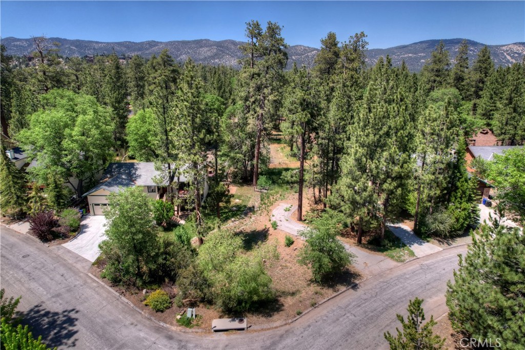 LAST LOT LEFT IN ALPINE WOODS ESTATES! Wait till you see this huge, gentle downslope lot complete with a "working set" of house plans with a plot plan for ADU valued over $20,000. Nearly permit ready, price include all grading plans, floor plans, elevations, etc. and are for a single story, 3 bedroom, 2 bathroom home on an 11,305 sq. ft. lot with a plot plan for an ADU. Great neighborhood all with underground utilities and backing to acreage.
