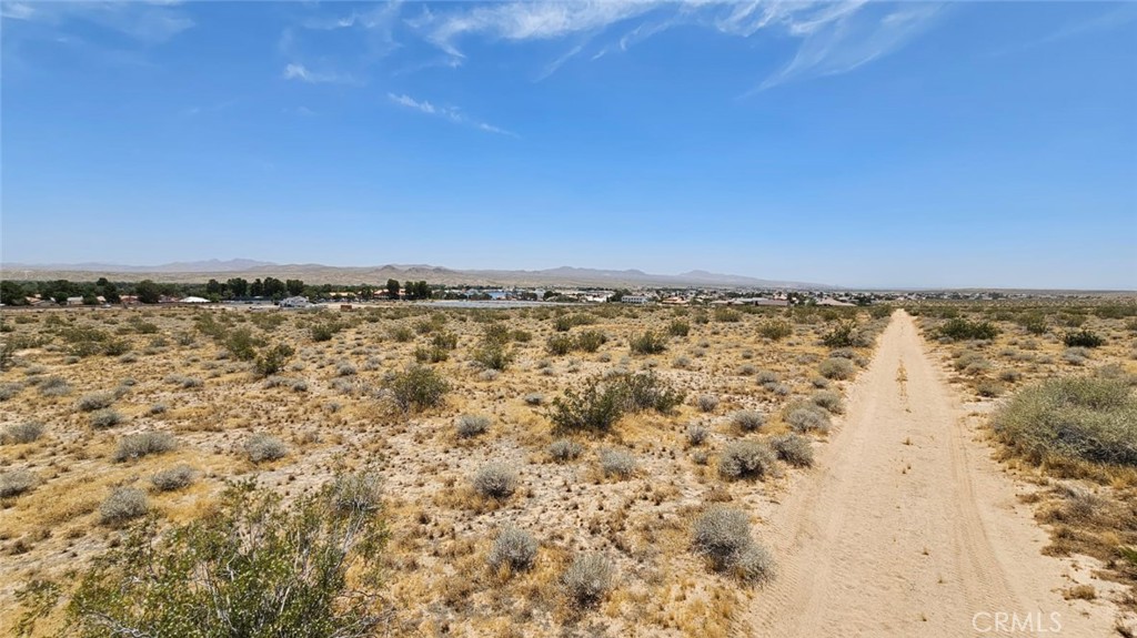 Attention, Attention!!! 9.96 acres in Helendale. Build your dream home. Conveniently located off the 395 Highway between Victorville and Barstow. No HOA.