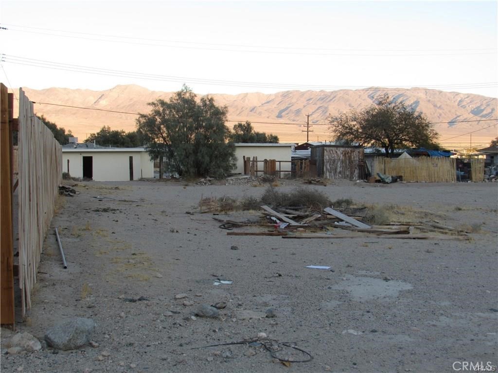What is reflected is the Parcel# 0485-112-06-0000 which is +/-0.228 Acres. Zoning is RS. Located in the area of Trona which is an Unincorporated area of San Bernardino County. Power is less than 50 ft.