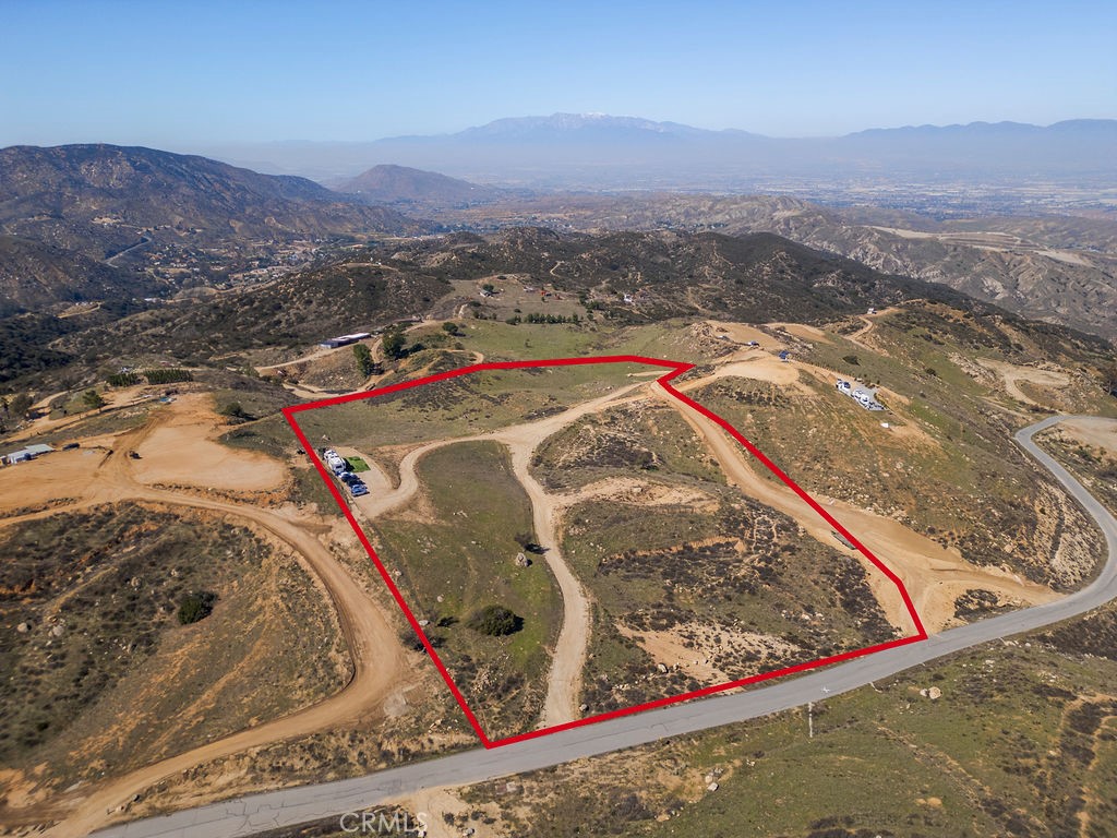 Welcome to an unparalleled opportunity to craft your masterpiece, Situated in a prestigious gated community, this fully graded lot offers breathtaking city light and mountain views! With direct road access, you have the flexibility to design multiple construction pads or one expansive estate. Whether you’re looking to build your dream home or secure a short-term investment, this lot is a rare opportunity. Located near Redlands’ top-rated schools, dining, and shopping, this property offers privacy, convenience, and limitless potential!