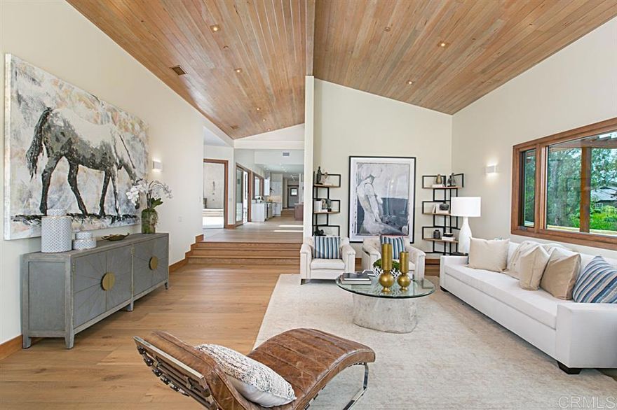 NEW PRICE!!! BRAND NEW Covenant construction, Close to 12,000 sq. ft. of covered space! Also known as 15658-60 El Camino Real, PERFECT TO LIVE-WORK-PLAY AT HOME. Best of Ranch lifestyle, minutes to village & coast, featuring 4 BD+/4 1/2 BA main house, 5 car garage, office/gym, multipurpose room, Additionally, 1,084SF 2 bedroom detached guest house/attached 2 car garage, multipurpose 1,740SF barn/gym/workshop, 75-ft long NCAA lap pool with spa, private nature trail, pastures, lawn for recreation- SEE SUPPLEMENT FOR MORE [Supplement]:Brand NEW construction, situated on a prime west side lot of the Covenant, this Rancho Santa Fe home defines the epitome of the Ranch lifestyle. Located at the junction of three towns, RSF, Del Mar and Solana Beach, and included in both Del Mar and Rancho Santa Fe zip codes. It has a gated entrance on both El Camino Real and Linea De Cielo. The main single level residence is 5,544 SF and includes, 4 (+ 2 optional) bedrooms, 4 1/2 baths, an office/gym/additional bedroom, an oversized attached 5 car garage, wine cellar and bonus room. The physical location is perfectly situated just far enough from the coast to avoid fog, yet not as dry and hot as further inland. The mostly level lot is a major asset and inviting for all activities. Built for today's lifestyle and ideal for an active family, this wonderful residence is filled with natural light and an abundance of windows. All rooms throughout the house feel spacious and connected, circulation is easy among the living room, dining room, family room and kitchen. As a primary gathering space, the kitchen is furnished with the highest quality cabinetry, luxury appliances and spacious pantry. The oversized island is covered with leathered finish Taj Mahai quartzite. The gorgeous wide plank European oak floors, sliding doors leading from the kitchen and family room to the pool/courtyard, oversized lanai and 12' wide panoramic window over the sink to the pool, recreation areas and pasture all add to this homes' exquisite environment. The large master bedroom suite includes an oversized walk-in closet, direct door access to the master patio/pool deck, his/her separate bathrooms adjoined by a spacious steam shower open to both sides. Additionally, it has private access to an attached multipurpose office, with its own entrance and kitchenette, set up for working from home, where visitors enter directly, not having to pass through the private residence. Three secondary bedrooms have large closets and inviting spaces. The residence has a large laundry room, a bonus room, a pool bath and an oversized shower room and an outdoor shower. This area adjoins a wine cellar/storage area and a five car+ 1,990 SF attached garage, complete with high ceilings for high profile vehicles and plumbing for an additional sink. Just up from the main house is an additional 1,084 sq. ft. 2 bedroom detached guest house with full kitchen, attached two car garage and its own driveway and private entrance off a different street from the entrance to the main house. Built simultaneously with the main house and barn, the ADU can be used for extra family, guests, caretaker or as a rental unit. To the southwest of the main residence and guest house, is a 1,740 SF. detached multipurpose barn which includes a half bath. The large structure can be used for multiple purposes as it can facilitate horse stables, an oversized gym with sports court, a car shop, art/craft studio, commercial workshop and much more. This space is a major asset to this spectacular home. In addition to all of the aforementioned attributes, the property includes an additional detached recreation room, a 75-foot long NCAA lap pool with spa, a recreational lawn area, pastures, two gated driveway entrances and it's own nature trail around the perimeter of the property, complete with viewing areas, stone bridges over quiet streams and private enclaves. All of this is located on 3.83 fully fenced acres.