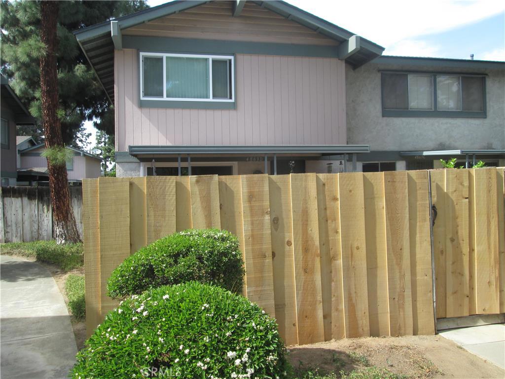 This is a move in ready home. There are 2 bedrooms, 1 bath , new windows, beautiful wood floors , new paint. sliding glass doors lead to brick patio with new wood fencing. This turnkey condo is located in a gated community that has green walkways and a pool. This is a must see!!
