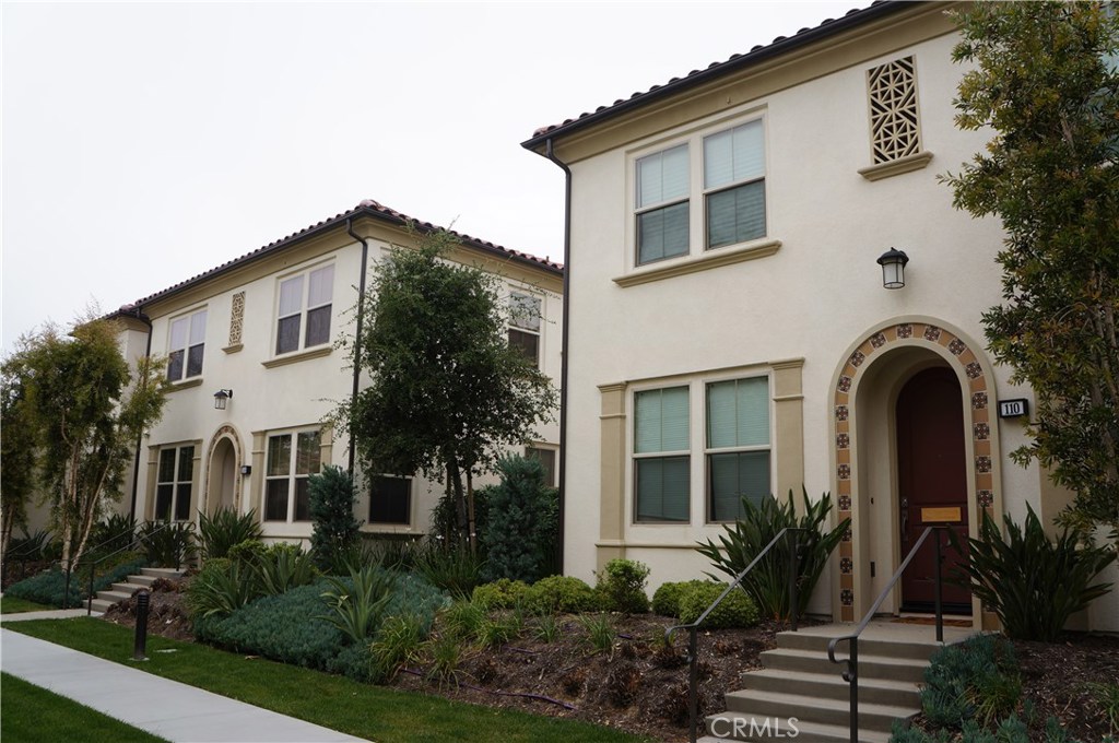 This is a wonderful opportunity to live the Baker Ranch lifestyle in this fully upgraded, turnkey Plan 2 townhome built in 2014. The home features 3 bedrooms and 3 bathrooms and has an open concept floor plan featuring 1,579 sf of living space. This home layout conveys a sense of openness that flows from the great room and large patio to an entertainment-friendly kitchen. The kitchen has white contemporary thermofoil cabinetry, granite countertops with 6” backsplash, convenient kitchen island with breakfast bar, and stainless steel built-in appliances. This home features premium hardwood flooring, upgraded designer carpet with upgraded padding, designer accent wall paint, and recessed lighting. The master retreat has walk in closets and upgraded master bathroom has dual vanities with a spacious shower. Home also has an upstairs laundry room. Wall mounted TV pre-wire in the great room. Home has attached 2-car garage with direct access into the home. This turnkey home is ready for move-in and offers a special opportunity to live in this highly regarded community. The community park offers sports fields, basketball courts, splash pad, playgrounds, picnic tables, sand volleyball to enjoy. Close to shopping, dog park, dining, employment centers, and entertainment. Short distance to Irvine Spectrum, 241 toll road and 5 and 405 fwy.