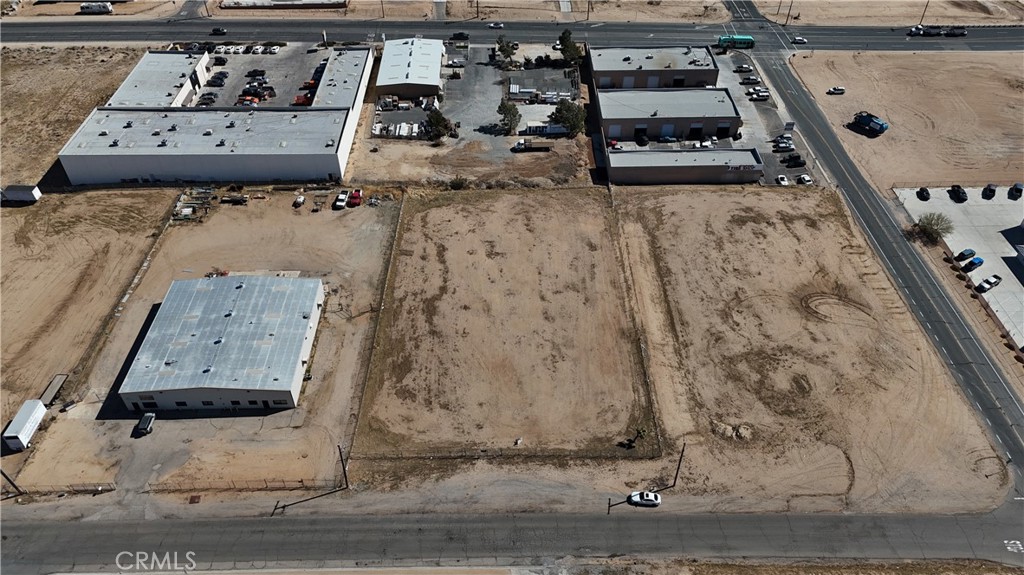 A truly remarkable opportunity in Hesperia. This 1.24-acre parcel of land, zoned for industrial use, presents endless possibilities for development.
Permitted uses for this land include manufacturing for a wide range of industries, such as apparel distribution, lumber and wood products, furniture, leather and leather products, machine shops, automotive and plastic products. Additionally, wholesale businesses, motion picture studios, truck terminals, contractor's equipment storage yards, and hay, grain, wood, and fuel oil storage and sales yards are also permitted uses. Auctions and construction equipment sales lots are also allowed.