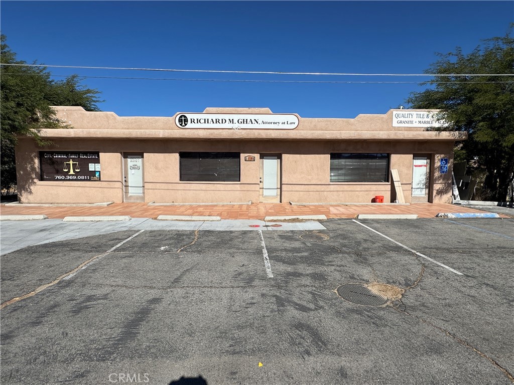 Opportunity knocking. A very nice office/retail building on the west end of Yucca Valley, on Highway 62, and on a corner lot. There could be room for another building or expand the parking (buyer should check with the Town). Three units. 2,282 square feet (each unit is approximately 760 square feet). One is currently combined with another for a large legal office. Third unit is currently rented. This could be a great, usable property or a nice income generator. There are not many small office units available in Yucca Valley. Great location and a great price. If you are looking to expand your portfolio, make sure to see this opportunity.