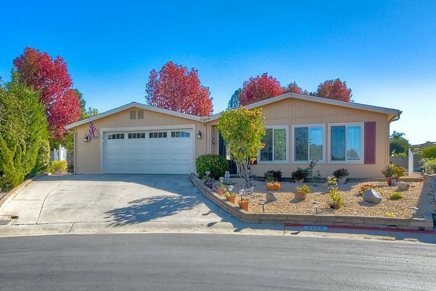 Great location at the end of cul de sac in a desirable 55+ gated community where you own the land! Located in beautiful Pilgrim Creek Estates, this 2 bedroom, 2 bath home has an oversized garage and a large backyard and is move in ready. Featuring a large living room and a beautiful, remodeled kitchen. Many upgrades include remodeled bathrooms and laundry room, laminate flooring throughout, new air conditioner, newer roof and dual pane windows. Close to all shopping and dining and a short drive to beaches and harbor. Pilgrim Creek Estates is a beautifully landscaped community that offers many amenities including a clubhouse with a full kitchen, billiard tables, gym, heated pool, jacuzzi and free RV parking. Low HOA fees of $373 per month includes water, trash and sewer fees.