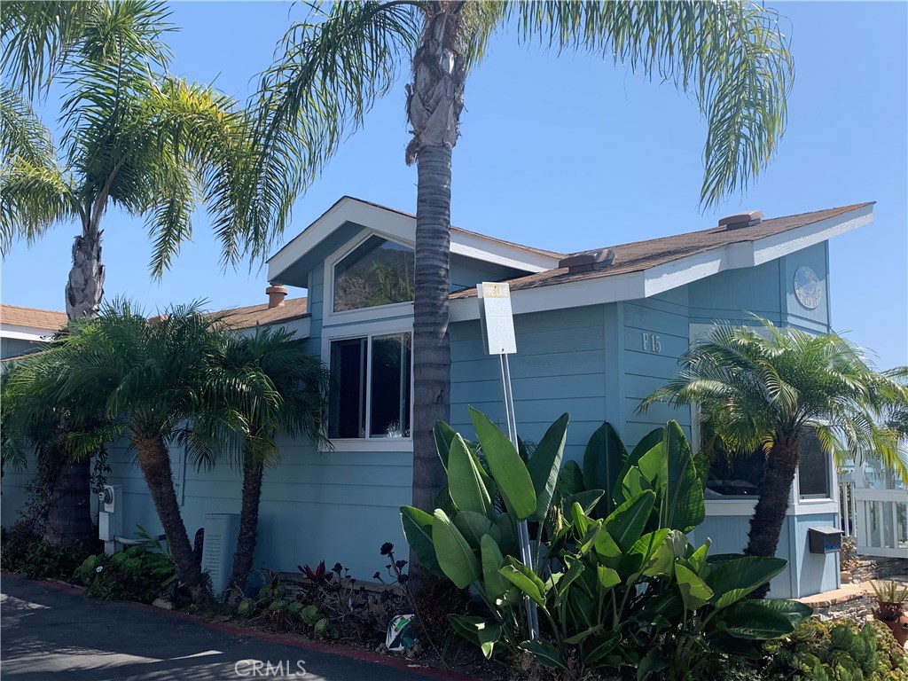 Motivated Seller!! on Corner lot with sunning panoramic ocean views! and a deck that is aprox. 500+ sq ft, 52' in length. Inside is bright and airy; with high ceilings and skylights. Spacious kitchen faces the ocean, large island provides informal seating. Lots of cabinets, newer appliances, upgraded counters tops and pantry, inside laundry and full size washer/dryer. Living room, dining and kitchen have surround ocean views! The master bedroom with a walk-in closet and private bath with dual sinks, separate shower and tub; opens onto the deck. Imagine enjoying morning coffee watching the tides! 2nd bedroom has wall to wall closet, 2nd bath has 2 sinks, tub/shower. 2 car off street parking, 5 minutes to shopping, restaurants, the prestigious Montage Resort, world famous beaches and the city trolley to downtown, art festivals. Present lease $4,777/monthly. The land lease adjusts yearly at 3% or CPI No HOA, No PROPERTY TAX, heated pool, spa, community center and coming soon, workout room. This home is spectacular, ready for you to call HOME!