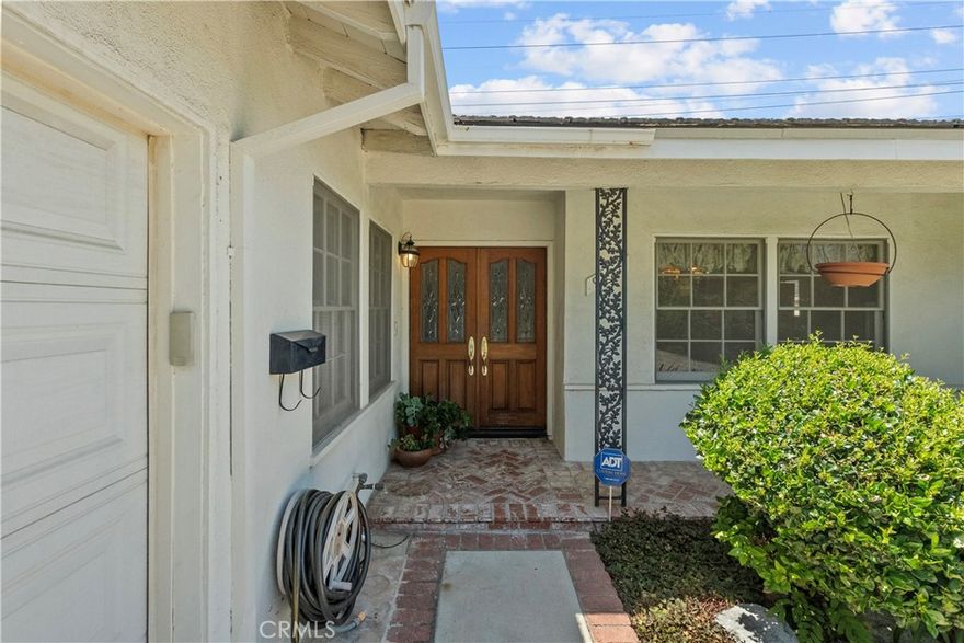 Welcome to this charming single-story home nestled in the heart of Northridge! Absolutely breathtaking curb appeal with lush landscaping & large driveway. This 3 Bedroom, 2 Bathroom, 1,631 Sq. Ft. home is situated on an expansive 7,516 Sq. Ft. Lot! The versatile den with pocket doors could be utilized as a 4th bedroom. Featuring a large, light & bright kitchen with an abundance of cabinetry and storage. The focal point of the open living room is a stunning stone fireplace. The private laundry room right off the kitchen is situated perfectly for your convenience. Step through the sliders into a substantial sunroom that can be reimagined to your heart’s desire! Your backyard is a tranquil sanctuary with lush landscaping, mature trees & plenty of grass. Sip your morning coffee listening to the birds singing with no rear neighbors. The ultimate in quiet relaxation & privacy! This wonderful home is in close proximity to the Northridge Fashion Center, great schools, amazing restaurants, the list goes on! Don't miss out on your opportunity to tour this special home in person; it’s truly the opportunity you have been waiting for!