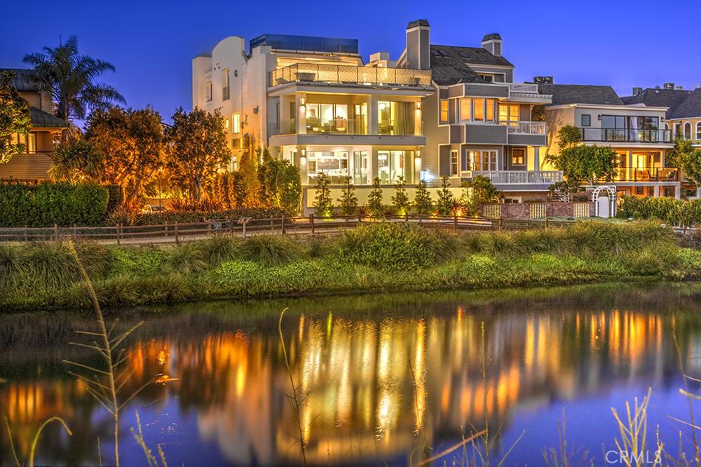 Simply the Best Property in the Silver Strand community of Marina Del Rey. This Inspiring Modern Masterpiece sits on the waters of the Grand Canal. This 7,574 square foot “Trophy Property” was built by a renowned Owner/Builder as his own home. Exceptional attention to detail, designer features and imported materials throughout. Truly a one of a kind property offering unparalleled levels of luxury including 6 bedroom suites, Professional grade Chef’s kitchen, state of the art Theatre, Wine cellar, Gym, Master and Retreat with separate His and Hers master Baths, all custom millwork, Elevator service plus much more. The main living areas meld into enormous deck terrace areas that stretch out to overlook beach Sailboats and sunsets. Perfect indoor/outdoor year round entertaining capturing the true essence of the Southern California Luxury beach lifestyle. Escape to the breathtaking roof top 360 panorama viewing deck with pool. Just a short stroll to the marina, fine dining, amenities, and the white sand beach. Bring your most discriminating clients.