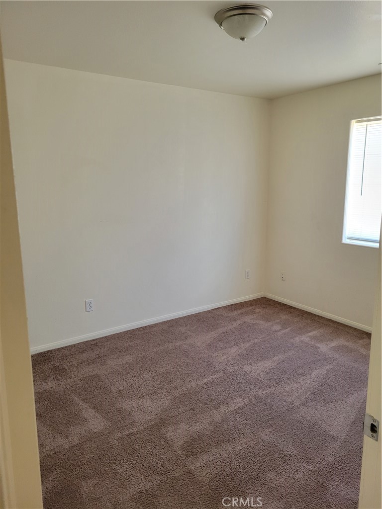 Photo 6 of 9 of 6262 Smoketree Avenue house