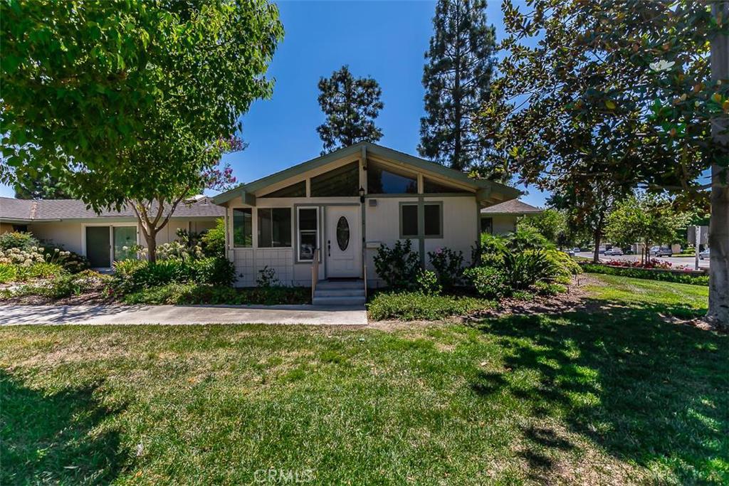 Single level, 2bd/1 1/2 bath home with vaulted ceiling. Park in front. Eat in kitchen, front and back doors for cross breeze. Large enclosed patio that is raised to same level as the kitchen. 2 skylights in Jack and Jill bathroom. Close to laundry. Unsurpassed facilities for active seniors. 7 clubhouses, 5 pools, golf, stables, card rooms, theater, arts/crafts, technology centers, 2 fitness centers, and more. Dues include water, trash, cable, maintenance in and out, insurance, free bus service, guarded gates and security patrols.