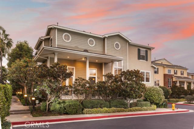Sunset Views from this stunning home located in desirable Boardwalk community. Beautiful end unit home with perfect orientation and location within the guard gated community of Boardwalk. Steps to the sand and surf this beautiful home shows like a model throughout. Entry has vaulted ceilings and formal living room with views of the lush landscaping throughout the community. Dining room and family room show light and bright with large windows and custom built-ins. Chefs kitchen has stainless steel appliances large island with seating and a convenient pantry. Laundry is on the upper level as well as 3 bedrooms. As you walk up the winding staircase to the top of the stairs you will find 2 guest bedrooms which share a hallway bath. The master suite has double door entry, a large closet as well as a spa like master bath with separate tub & shower and double sinks with stone accents throughout. This highly desirable floorplan also has a versatile office with custom builtins and french doors leading to patio. Two car garage with direct access and more additional storage space. Home features amazing crown molding, recessed lighting, plantation shutters and sunset views from the master. Steps to Dog Beach, the Ocean and Bike Trails up and down the coast.