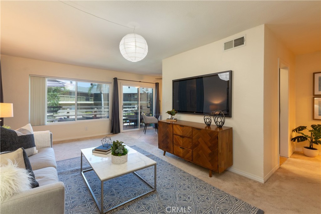 Step into your upgraded haven at Creekside Village! This captivating 2-bedroom condo offers a tranquil escape, where natural light cascades through oversized windows into the dining room, kitchen and spacious living room. Envision mornings spent savoring breakfast on your private and spacious balcony, as you move seamlessly from the the dining area, overlooking the inviting greenbelt and pool. Retreat to the main bedroom, boasting a generous walk-in closet and a luxurious bathroom adorned with Granite countertops and plenty of storage. With a second bedroom or den provides versatility with its large closet. Insulation and drywall have been added to the second bedroom ceiling. This is more than just a home—it's an oasis of luxury living. Explore the community's amenities, from the sparkling swimming pools to the charming BBQ areas, and discover a lifestyle of unparalleled comfort and convenience. This community offers gated parking ensuring a sense of security. With HOA covering fees for the essentials like water, trash, sewer, gas, and common area maintenance, living in Creekside Village is very affordable. The stage is set for effortless living in your own private paradise. Don't miss the opportunity to make this retreat yours!