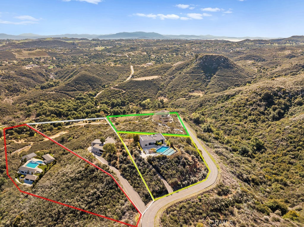 VIEWS | PRIVACY | 18+ ACRES | POTENTIAL SUBDIVISION- 4 LOTS | You have ARRIVED! 18 .92-acre parcel with potential to split to 4 lots. Previous owner started the split process and had the biological assessment including preliminary pads for four lots. Enough land for horses, orchards, avocado groves, cannabis cultivation, the possibilities are endless!
360º views from your own hilltop and ultimate privacy can be yours! Utilities (watermain and electric) on street (Hombre Ln). Welcome home to La Cresta Highlands on the Santa Rosa Plateau, perched between the Cleveland Forest and the 8500-acre oak-laden preserve. Private community is only minutes to fine dining, shopping, golf and Temecula Wine Country!!
RA-5 Zoning allows: One-family dwellings. Noncommercial keeping of horses, cattle, sheep, and goats on lots over 20,000 sf. and 100 ft. in width. Two such animals on each 20,000 sf. up to 1 ac., and two such animals on each additional acre. Some agricultural uses, and limited noncommercial animal husbandry, 4-H projects. Agricultural mobile homes permitted for owner/farm worker for each 10 acs. being farmed. Wholesale nurseries, greenhouses, orchard, aviaries, apiaries (subject to County Ordinance No. 551), the raising of field crops and tree crops, berry and bush crops, and vegetable, flower and herb gardening on a commercial scale; the drying, packing and processing of fruits (other than canning), nuts, vegetables and other horticultural products where such drying, packing or processing is primarily in conjunction with a farming operation and provided the permanent buildings and structures used in conjunction with such drying, packing and processing operations are not nearer than 20 feet from the boundaries of the premises. Farms or establishments for the selective or experimental breeding and raising of cattle, sheep, goats, and other farm stock or animals subject to the permissible number, conditions, and provisions set forth in Subsection A.7. of this section.