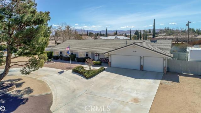 Honey Stop the Car! Well cared for Custom home in great area of Apple Valley. Formal living and dining, family room with wood stove to warm those cool desert nights. Upgraded country kitchen, granite, center cook island, pantry, blt-in oven, loads of storage and sunny nook. Huge master bedroom with french doors to private patio. Master bath has been upgraded with jetted tub,dual sinks, marble countertops and separate shower. Secondary bedrooms are ample with remodeled hall bath.Indoor laundry room has walkin storage and 1/2 bath with door to rear yard. Home boasts enclosed 300 sqft patio room, in-ground solar heated pool horseshoe pit, fully fenced for privacy, Circle drive, 3 car attached garage and RV Parking. Energy efficient home with ducted evaporative cooler and central air, hot water circulation system and security system. Located in very desirable school district. Put this one on your list to see...you will not be dissapointed! Association Amenities: None # of RV Spaces: 0 Special Features: BN,,,PTRY,WSECNONE Lot Location Type: Standard Location Landscaping: Full Special Features: Cable TV,Garage Door Opener # of Attached Spaces: 3 # of Detached Spaces: 0