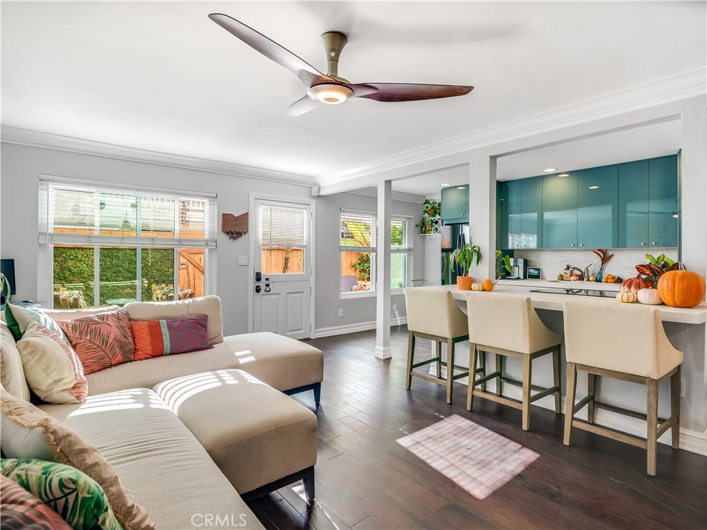One-of-a-kind 1 Bedroom in Downtown Huntington Beach run by Incredible Smart Home Technology. Ultimate Modern-Living Home Package only 1 Block to the Beach. Stunning Total Remodel with New Plumbing & Electrical! Enjoy the Ocean Breezes on this south facing Private Front Patio, Exceptionally Designed for Entertaining, w/ Custom Lighting, Artificial Turf / Porcelain Tile Landscaping, and TV mount for all your sports-watching needs. Additional Private Patio in Rear Perfect for a dog! Renovated Kitchen includes: Thermador Appliances, Custom Cabinets (electrical within), Modern Counter-tops, Over-sized Drawers w/ Hidden Drawers within, Counter-top Lighting and More. Remodeled Bathroom includes New Shower w/ Heavy Glass Doors, Vanity, Cupboard, and Toilet. 2 closets in Master Bedroom, including Walk-In. Deemed a Single Family Home on title (beneficial for financing) this Smart Home has a very low HOA. Bonus, Large street-facing Patio is common area for all Four Units, Ideal for 4th of July Party! Truly Turn-key and ready for Executive, Bachelor, couple, or anyone looking for Modern/Contemporary Single Level.