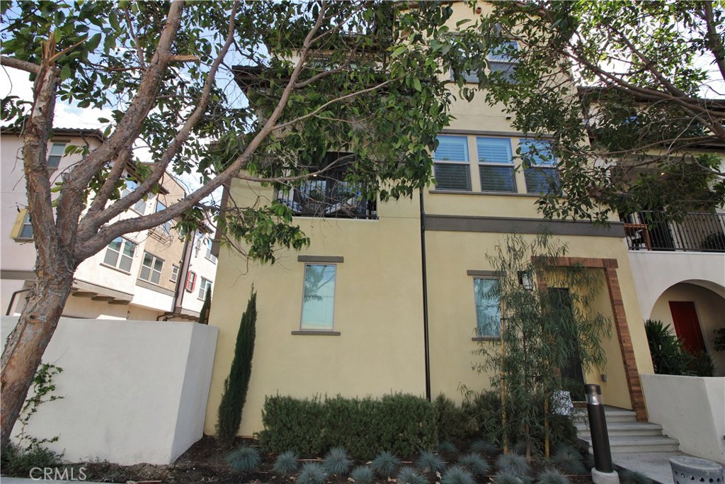 Beautiful SOLAR POWERED all electric townhome in the "Santa Ana Collection" community. It features 2 bedrooms 2.5 bathrooms. The master bedroom has a large walk-in closet and it's own private bathroom. It features designer upgrades; including a beautiful kitchen with quartz counter tops, dark wood cabinets, wood flooring, and plantation shutters. This home has been fitted with energy efficient and earth friendly designs with solar, Nest Thermostat, and insulation that creates an energy efficiency that exceeds the 15% of state mandated standard. Extra large attached 2 car garage. The community amenities include a play ground, a dog park, garden, and fire pits. Just minutes away the 405 and 22 freeways, Southcoast Plaza and the beach! You will love this home!!