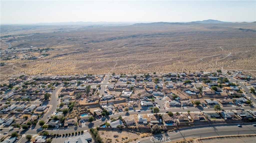 This is an incredible opportunity to own a beautiful 580 acre property, consisting of 4 parcels. The lots have flat to rolling topography, and are zoned RL (Rural Living). This zoning allows for single family homes (5 acre minimum lot size), and a wide variety of agricultural uses. Furthermore, similar size/zoned lots have recently been utilized as solar farms and wind farms, especially with its ideal location, halfway between Los Angeles and Las Vegas. Additionally, there were entitlements pursued (but not approved, about 16 years ago), for a master planned development of approximately 2500 residential lots, including a golf course.
The lots border a paved and developed street, and are less than ten minutes to the 15 and 40 Freeways. The property is also less then thirty minutes to one of the largest solar projects in the state, which is the Mojave Solar Project. Moreover, the property is less then an hour and a half from various military bases: The US Naval Air Weapons Station in Ridgecrest (1.5 hours), Edwards Airforce Base in Rosamond (1 hour), and Ft. Irwin Army Base (45 minutes). This is an exceptional opportunity to purchase an enormous 580 acre property in Southern California, between Los Angeles and Las Vegas.